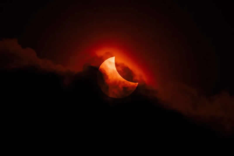 Our Sun - Highly commended: Moody Partial Solar Eclipse &copy; by James McBeath - ZWO Astronomy Photographer 2026 Winners