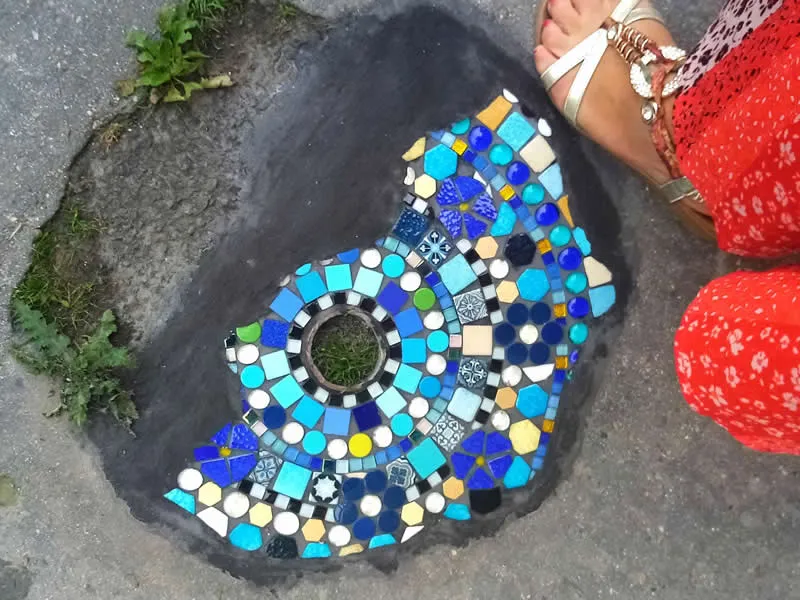Azure blue mosaic flowers, like a fragment of One Thousand and One Nights beneath your cobblestones.