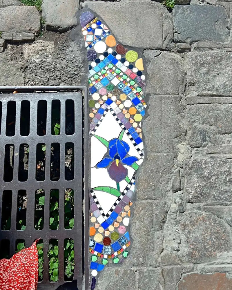 Owl Street, I offer you this elegant floral mosaic to repair the potholes in the asphalt, filling some of your missing paving stones.
