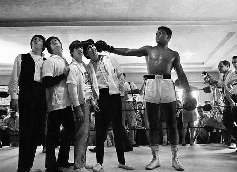 40 Historic Photos That Will Completely Change How You See the Past 76 The Beatles pose with “The Greatest”, Muhammad Ali at the Fifth Street Gym on Miami Beach, 1964.