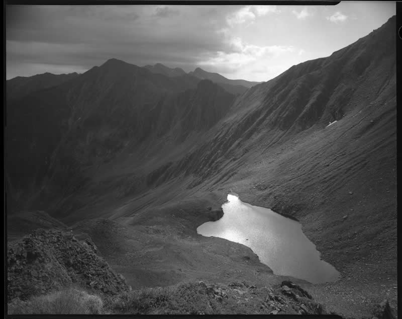 Earth in Elegant Monochrome: 40 Landscape Winners From the MonoVisions Awards 2026 54 Lake Avrig by Adam Bencal, Poland - MonoVisions Black and White Awards Landscape 2026 Winners