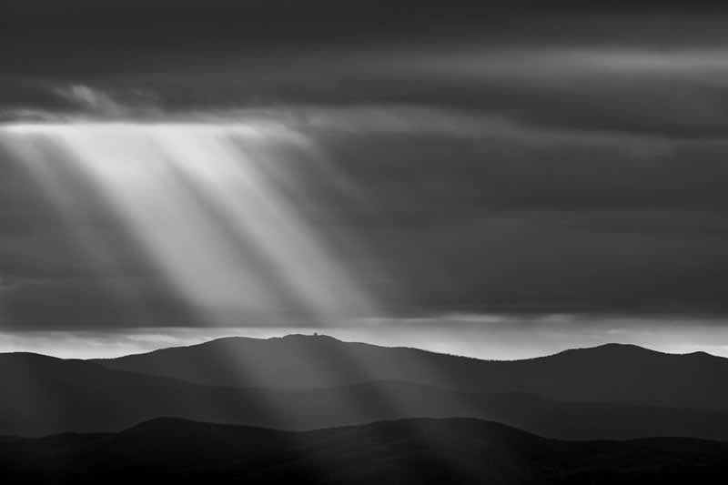 Earth in Elegant Monochrome: 40 Landscape Winners From the MonoVisions Awards 2026 61 The dawn of a new year by Marco Campinoti, Italy - MonoVisions Black and White Awards Landscape 2026 Winners