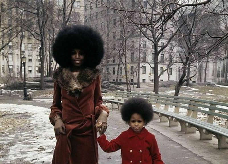 1970. Mom & Daughter Show off their Outstanding Spectacular Afros while out for a Walk