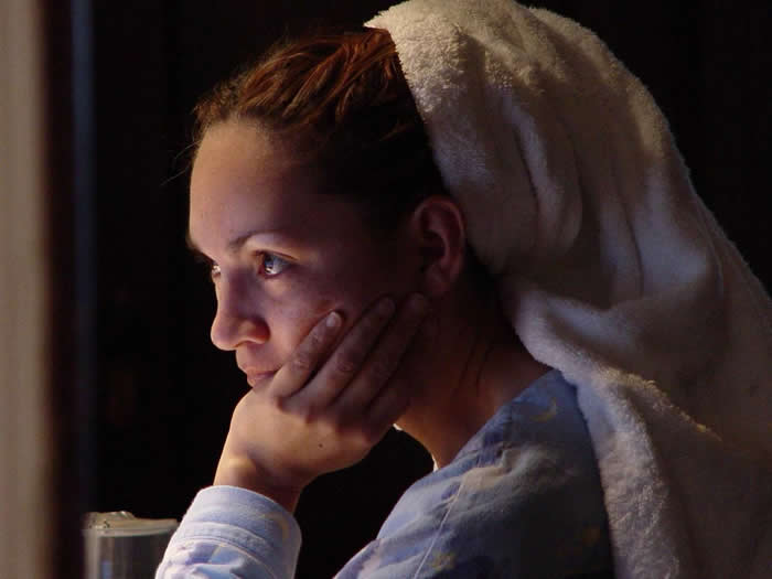 My wife just out of the shower checking email - Photos looks like Paintings