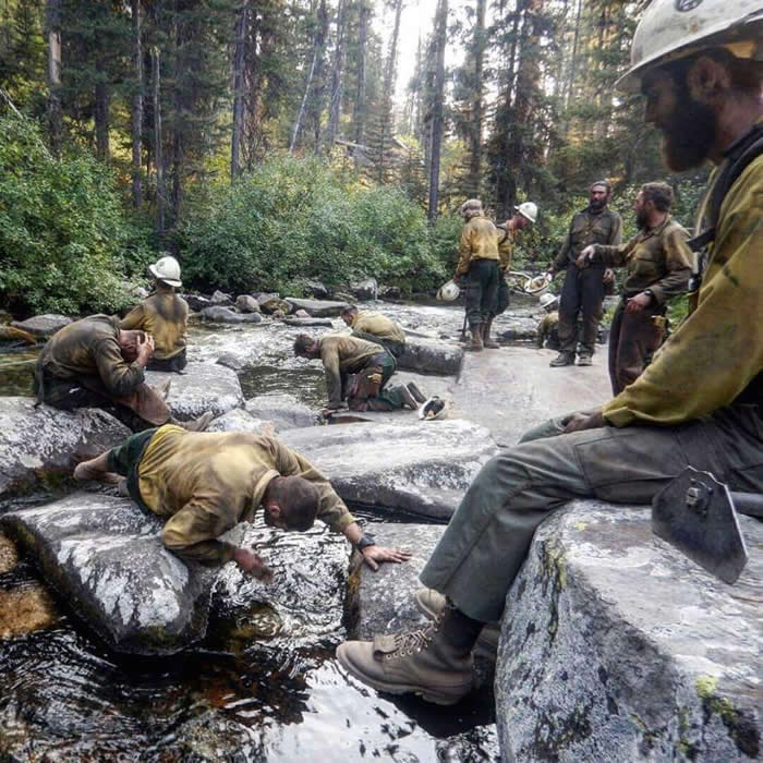 Firefighters taking a break out west - Photos looks like Paintings