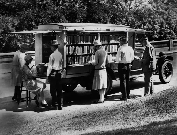 The bookmobile was a traveling library often used to provide books to villages and city suburbs that had no library buildings. It went from a simple horse-drawn cart in the 19th century to large customized vehicles that became part of American culture and reached its height of popularity in the mid-twentieth century.