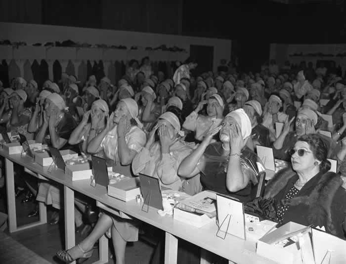 Before make up tutorials on YouTube, you had this. Pictured: Audience of women applying makeup at lecture by beautician Manka Rubenstein in Los Angeles, Calif., circa 1950.