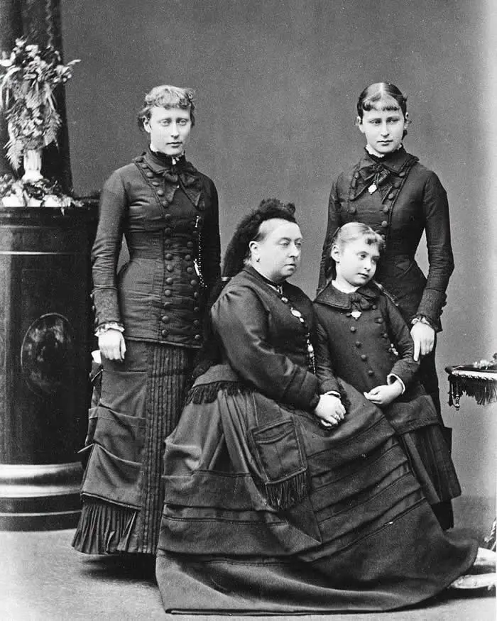 Queen Victoria with Princess Victoria, Princess Elizabeth, and Princess Alix of Hesse, 1879.