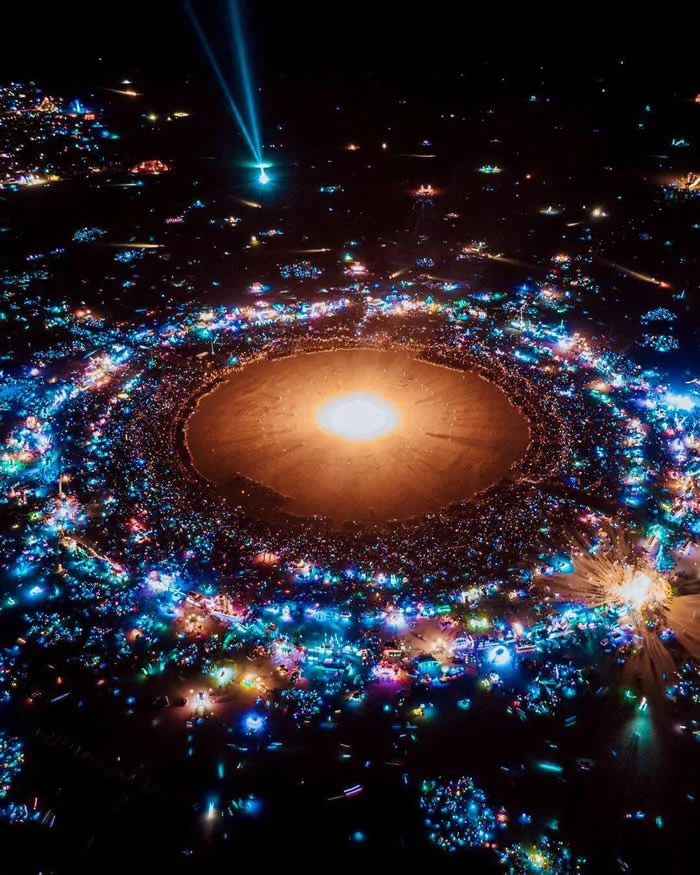 Look Twice! 40 Confusing Perspective Photos That Will Trick Your Eyes 41 A shot of burning man that looks like a solar system - Confusing Perspective Photos