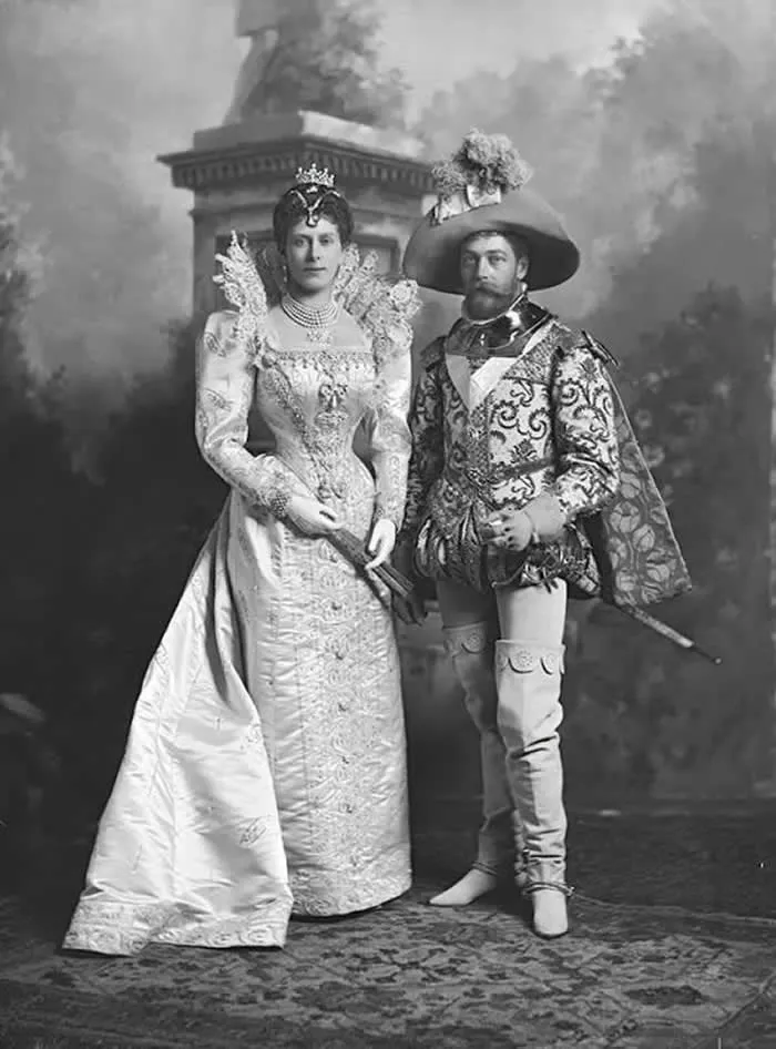 The Duke and Duchess of York (later King George V and Queen Mary) dressed as 17th Century courtiers for a fancy dress ball. England, 1897