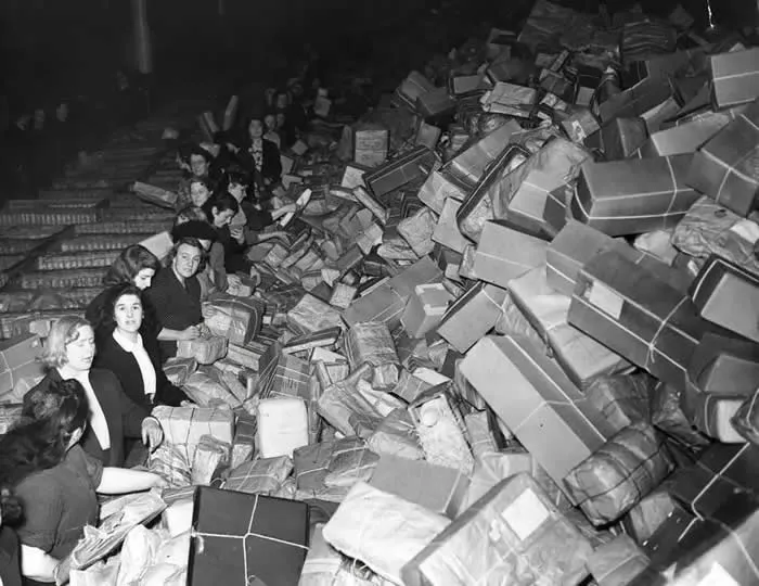 Enormous pile of holiday packages, Mount Pleasant Post Office, London, United Kingdom, 1952.