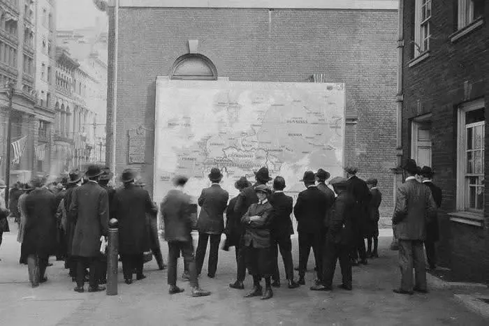 Passers-by study a new map of Europe after World War I, 1918.