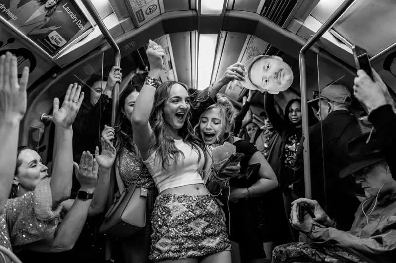 3rd Place Winner: Carrying Joy by Chris Mozyro, United Kingdom - MonoVisions Awards 2026 Street Winners