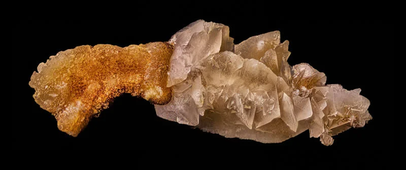 42 Award-Winning Photos From Nikon Small World Photomicrography Competition Reveal a Hidden Universe 84 A kidney stone showing two formations: a smoother mineral buildup and sharp crystalline growth by Saulius Gugis - Nikon Small World Photomicrography Competition Winners
