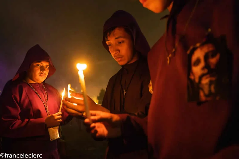 Capturing Humanity: Award-Winning Photographer France Leclerc Explores Life Around the World 46 Candles are lit during the night processions of the Semana Santa in Antigua - Street and Documentary Photography by France Leclerc