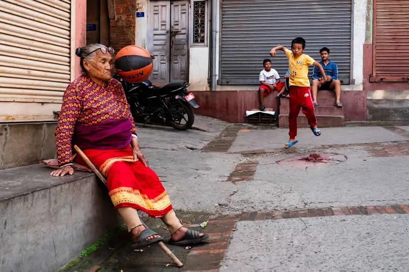Capturing Humanity: Award-Winning Photographer France Leclerc Explores Life Around the World 49 Street Scene, Lalitpur, Nepal - Street and Documentary Photography by France Leclerc