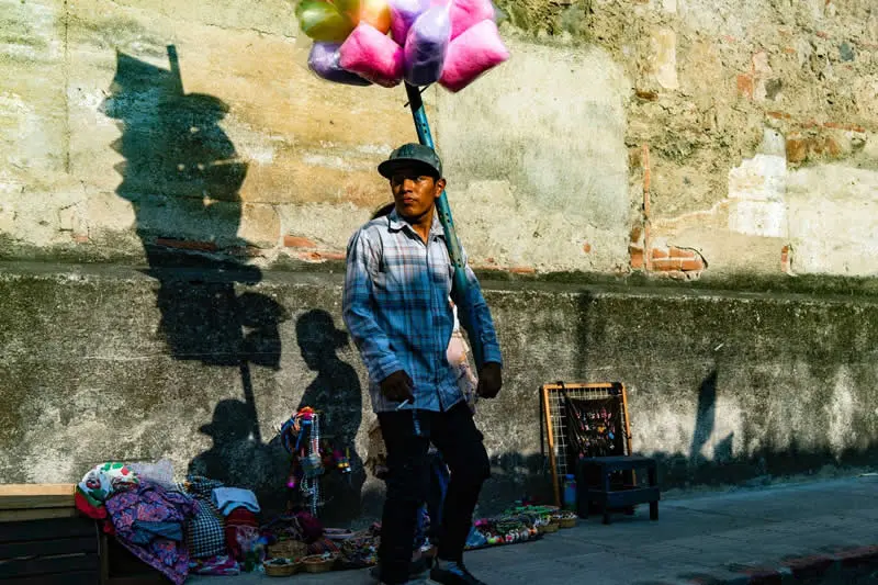 Capturing Humanity: Award-Winning Photographer France Leclerc Explores Life Around the World 56 Street vendors, Antigua - Street and Documentary Photography by France Leclerc