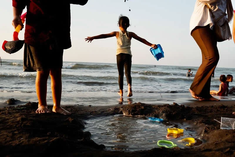 Capturing Humanity: Award-Winning Photographer France Leclerc Explores Life Around the World 67 Fun at the beach in Cirebon, Indonesia - Street and Documentary Photography by France Leclerc