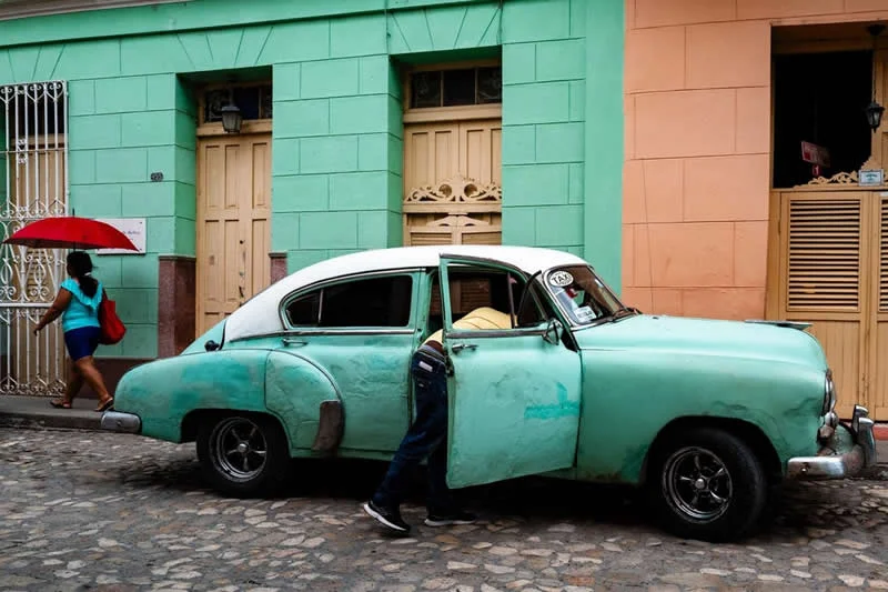 Capturing Humanity: Award-Winning Photographer France Leclerc Explores Life Around the World 71 Turquoise scene, Trinidad, Cuba - Street and Documentary Photography by France Leclerc