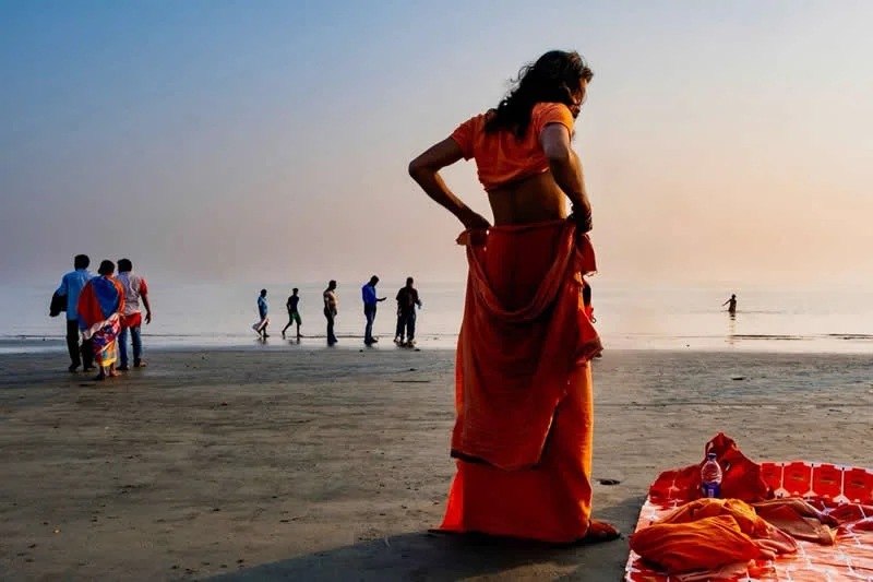 Capturing Humanity: Award-Winning Photographer France Leclerc Explores Life Around the World 75 Devotees ready to take a holy dip at the confluence of the River Ganges and of the Bay of Bengal - Street and Documentary Photography by France Leclerc